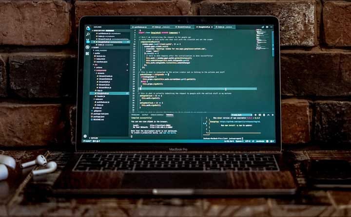 Developer working at a computer — different types of web development